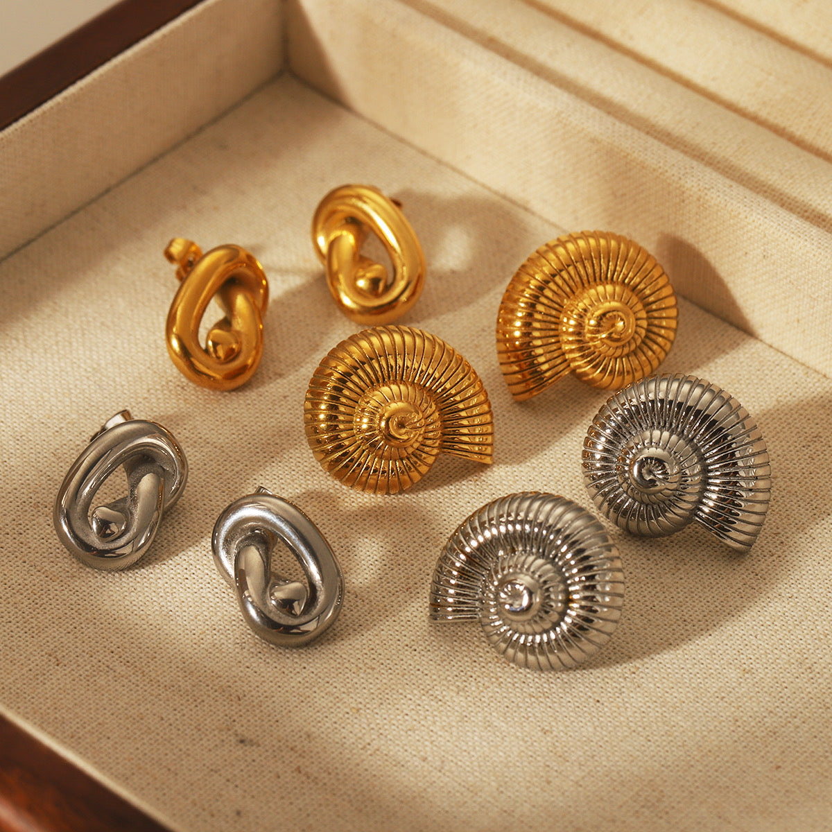 Boucle spirale dorés