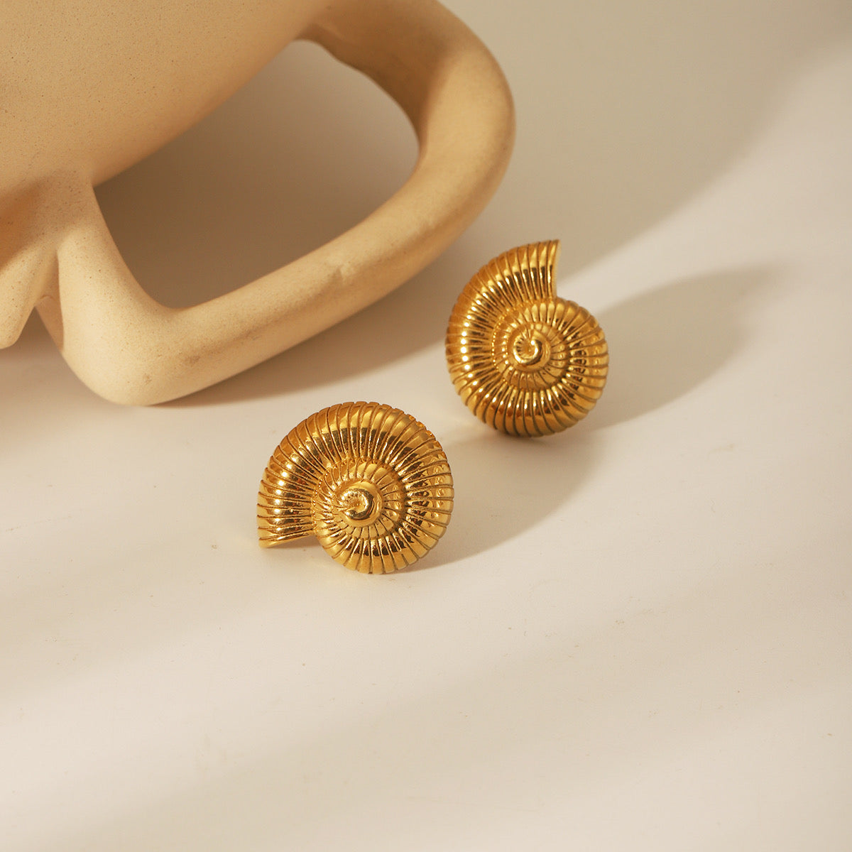 Boucle spirale dorés
